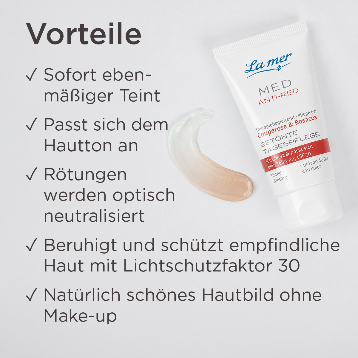 Frau mit La mer MED Anti-Red getönter Tagespflege für zu Rötungen neigende Haut